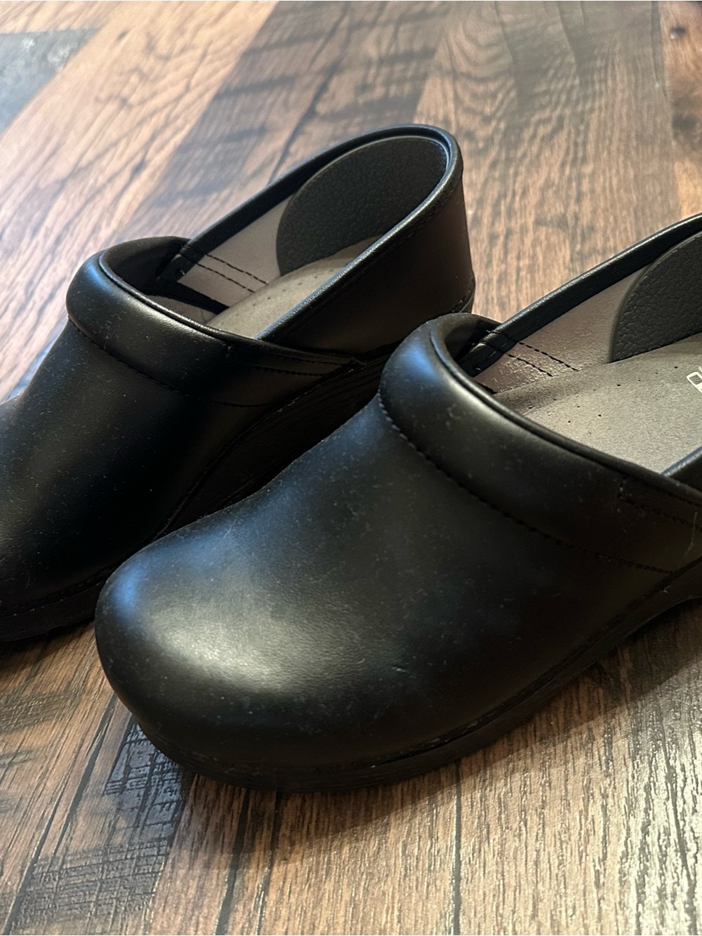 Dansko Black Slip-On Leather Clogs